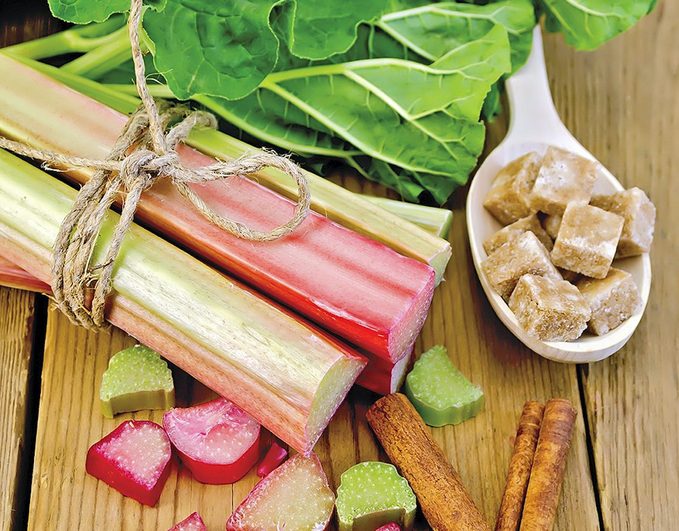 Rhubarb On Board With Sugar And Cinnamon